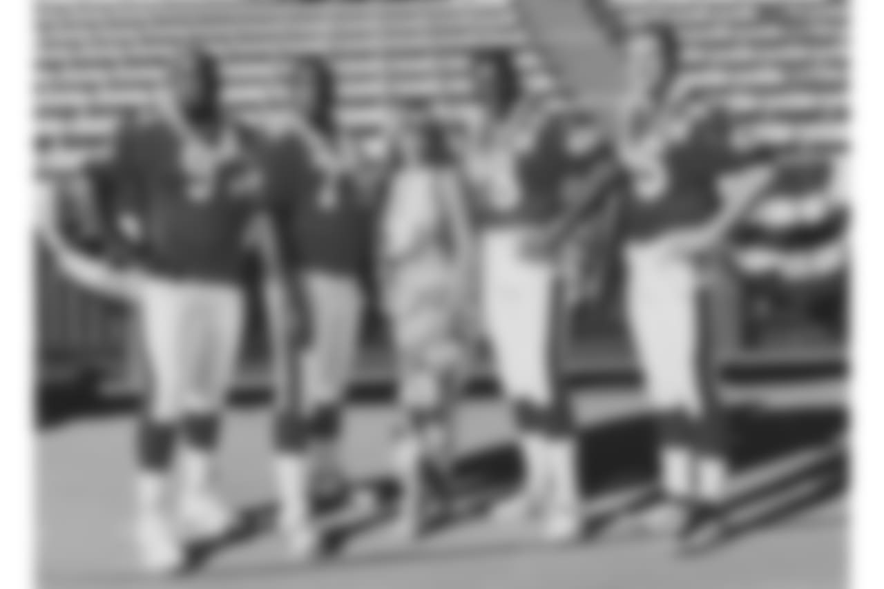 NT Ted Washington, G Ruben Brown, DE Bruce Smith, LB Bryce Paup (1997)