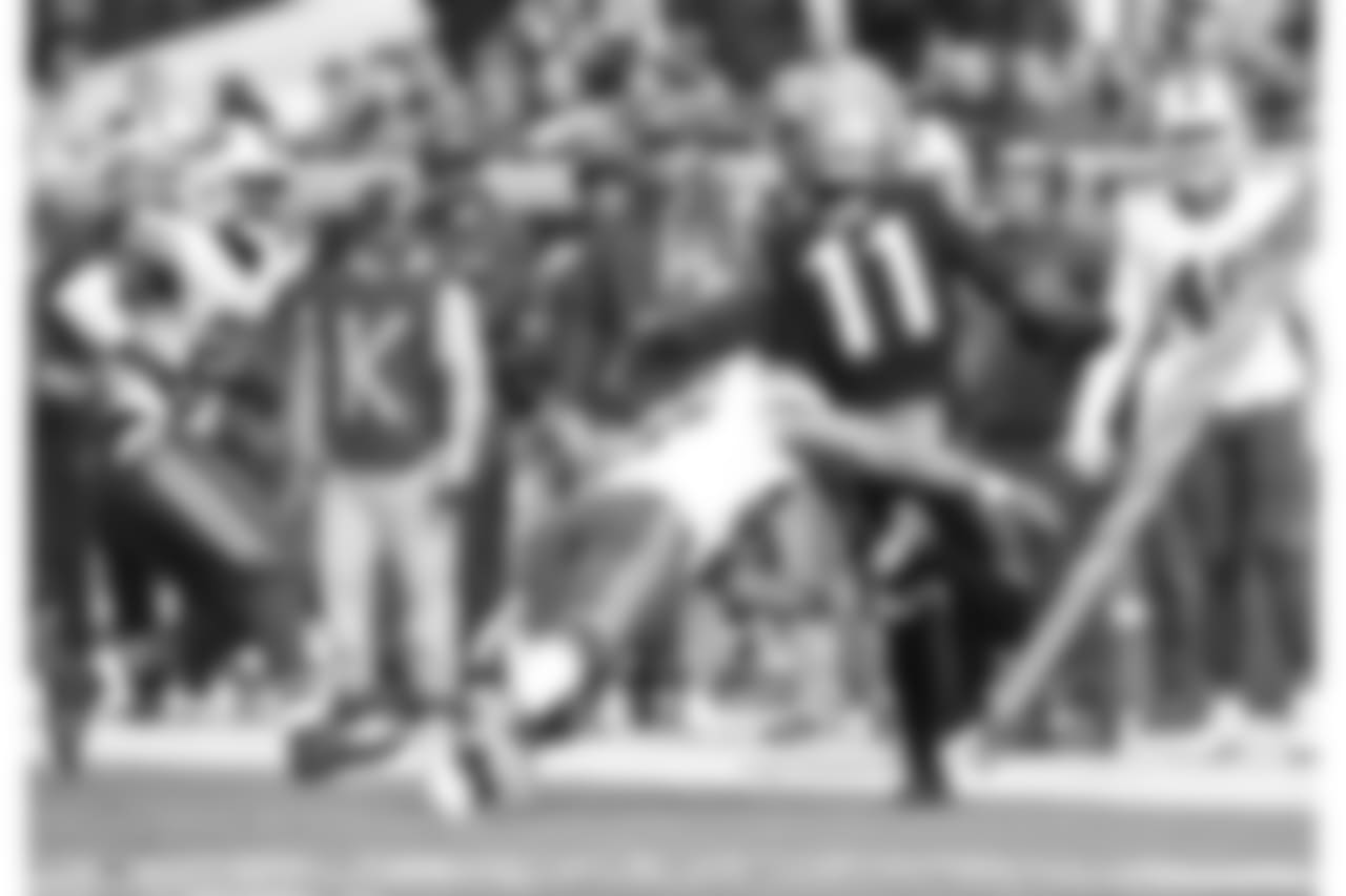 Jerry Hughes #55, DE, and Jordan Poyer #21, S