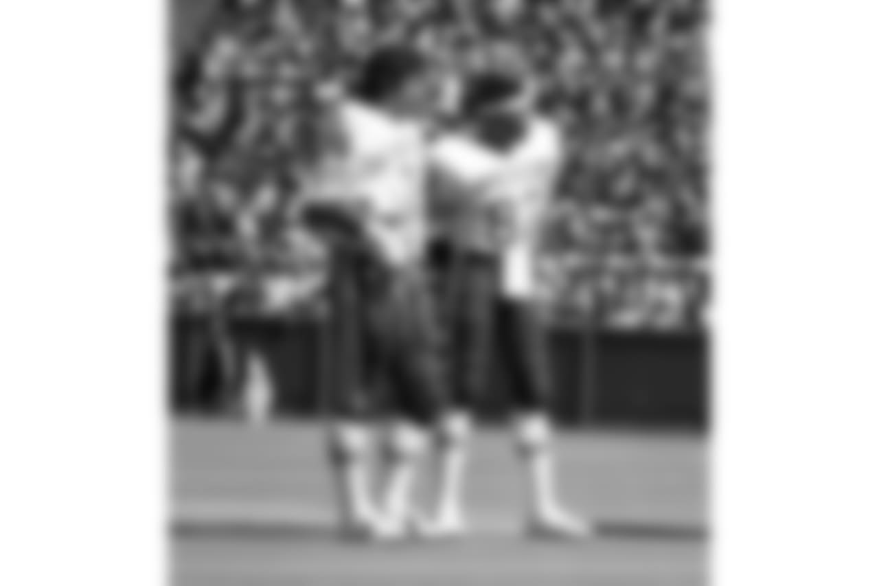 NT Fred Smerlas, WR Frank Lewis (1981)