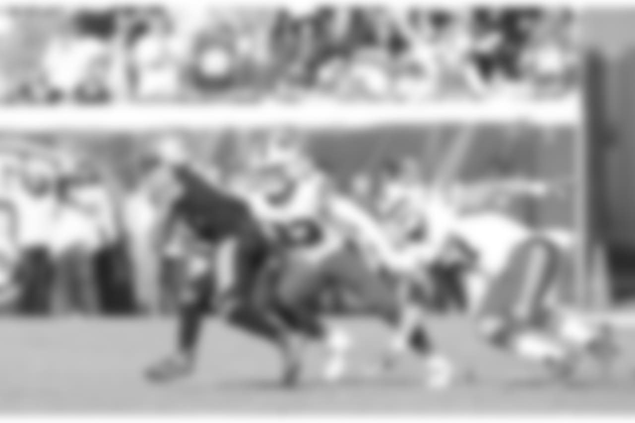 Micah Hyde #23, S, and Lorenzo Alexander #57, LB