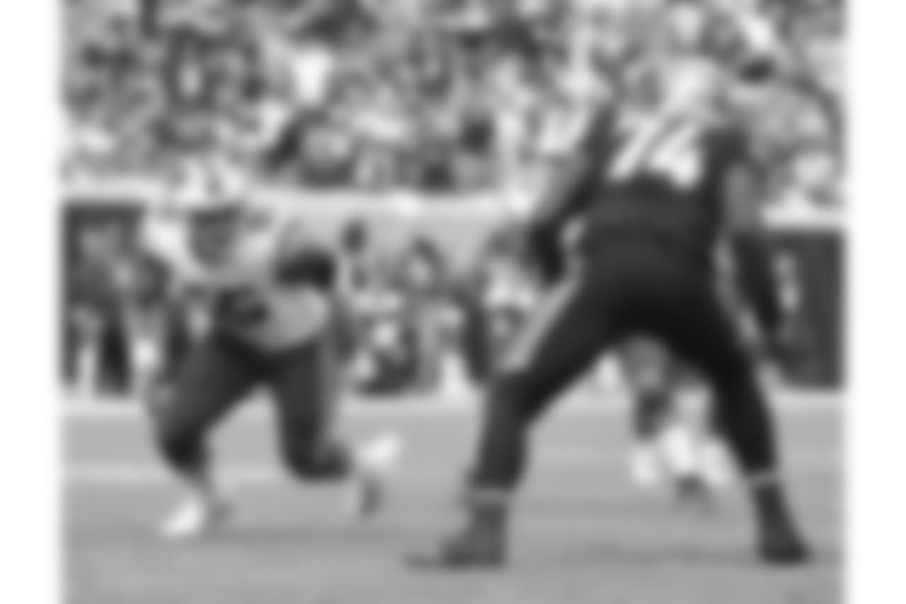 Jerry Hughes #55, DE
