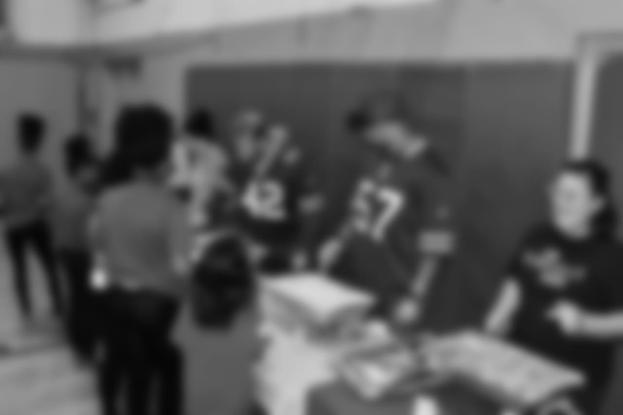 Patrick DiMarco (42) and Lorenzo Alexander (57) at Northwest Buffalo Community Center