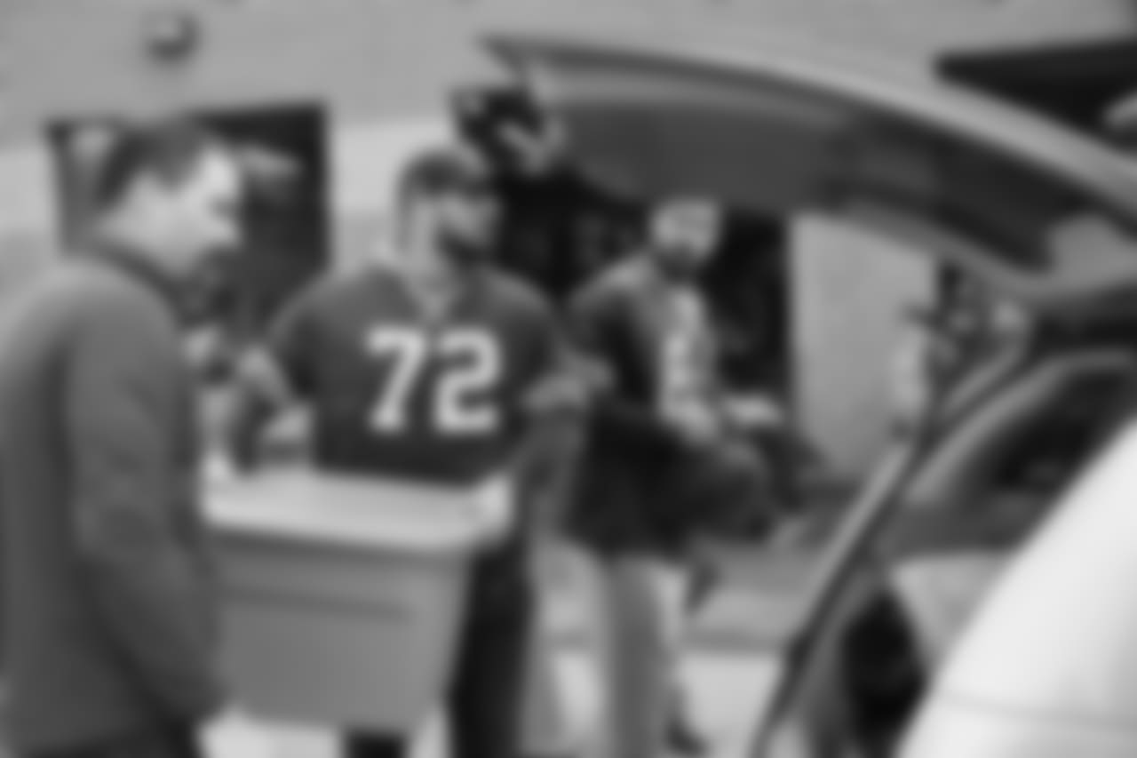 Bills Cheif Administrative Officer Dave Wheat, Ryan Groy (72) and Logan Thomas (82) at Bills Thanksgiving Blitz