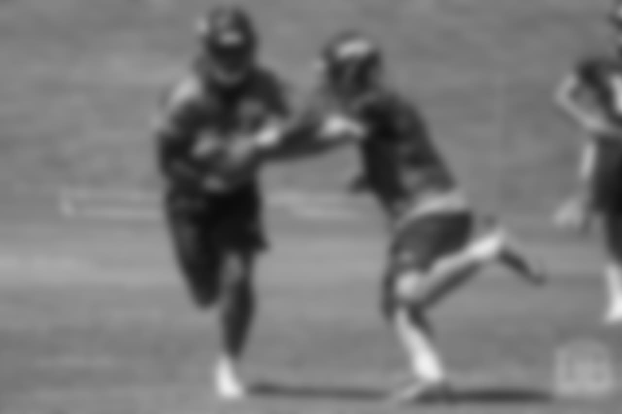 running back David Williams (36) takes a handoff during the 10th and final day of OTAs on June 7, 2018 at UCHealth Training Center.
