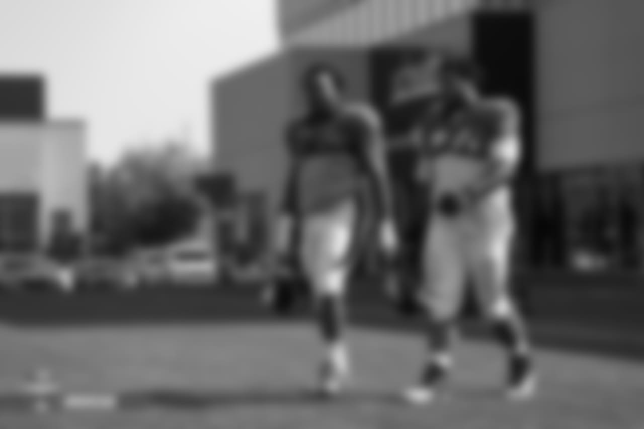 Guard Max Garcia (76) and tackle Jeremiah Poutasi (74) during the ninth day of training camp on August 7, 2018, at UCHealth Training Center.
