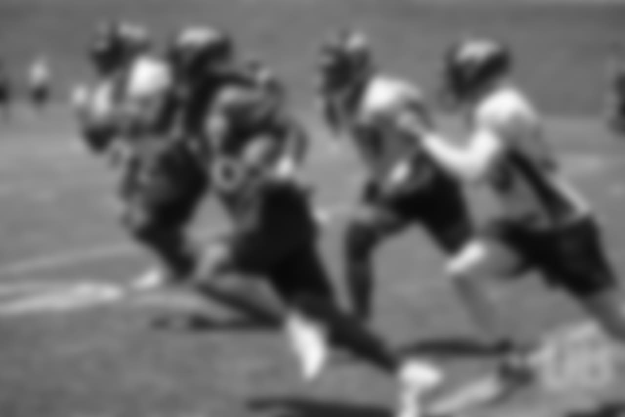 running back David Williams (36) is chased by multiple defenders during practice at the eighth day of OTAs on June 5, 2018.