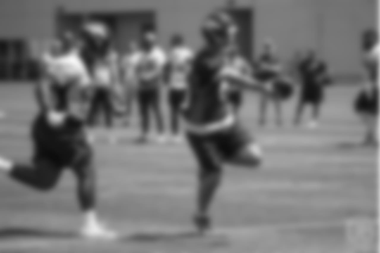 quarterback Chad Kelly (6) runs in for a touchdown at the ninth day of OTAs on June 6, 2018 at UCHealth Training Center.