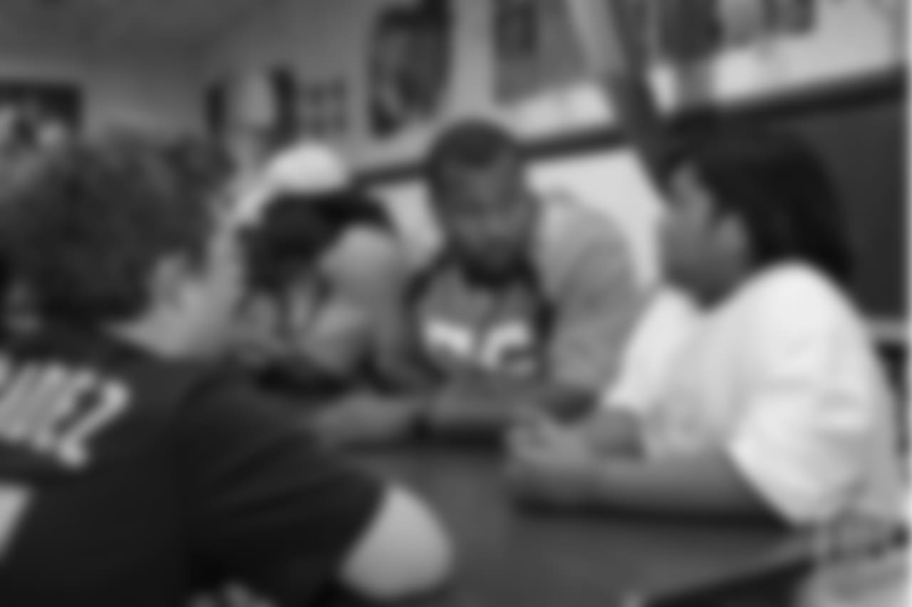Outside linebacker Bradley Chubb (55) talks with a couple kids at the Denver Broncos Boys & Girls Club at the Broncos' third annual Rookie Community Service Day on June 11, 2018.