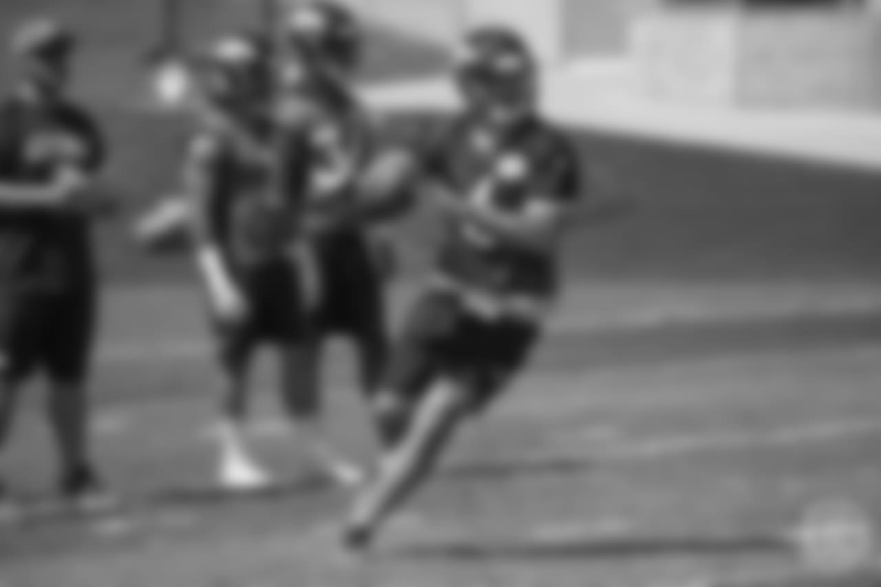 quarterback Chad Kelly (6) rolls out to throw at the ninth day of OTAs on June 6, 2018 at UCHealth Training Center.