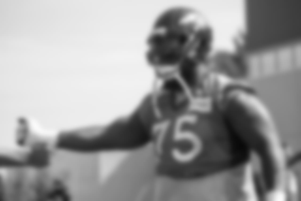 tackle Menelik Watson (75) at the ninth day of OTAs on June 6, 2018 at UCHealth Training Center.