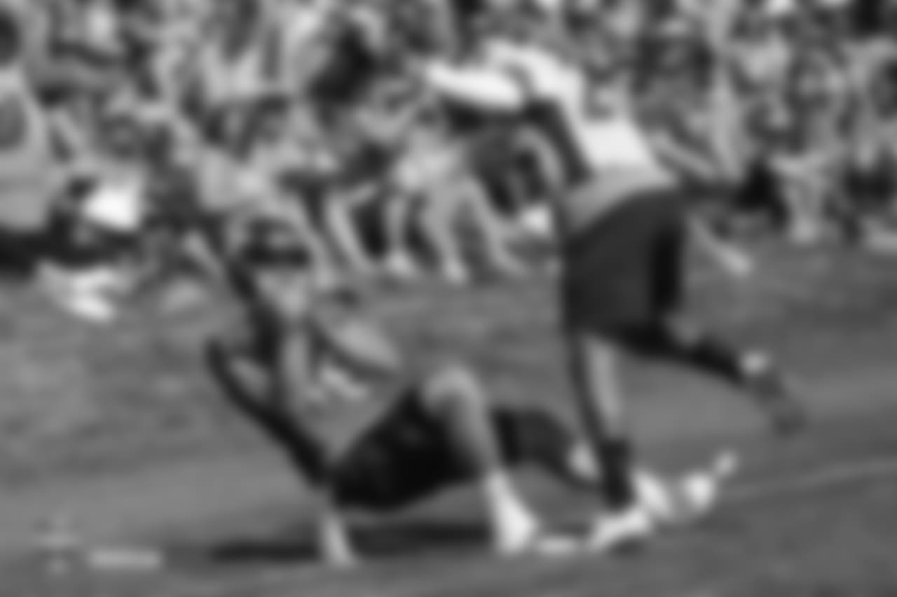 Wide receiver River Cracraft (15) comes down with a touchdown catch as cornerback Chris Harris Jr. (25) provided tight coverage during the 11th day of training camp on August 9, 2018, at UCHealth Training Center.