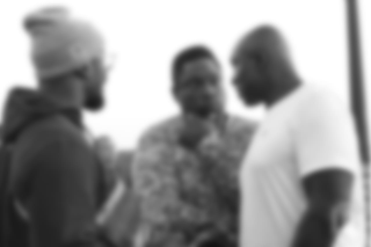 Von Miller talks with Warren Sapp and Bruce Smith on the first day of Von Miller's Pass Rush Summit, which included a welcome session and a night of games on June 27, 2018.