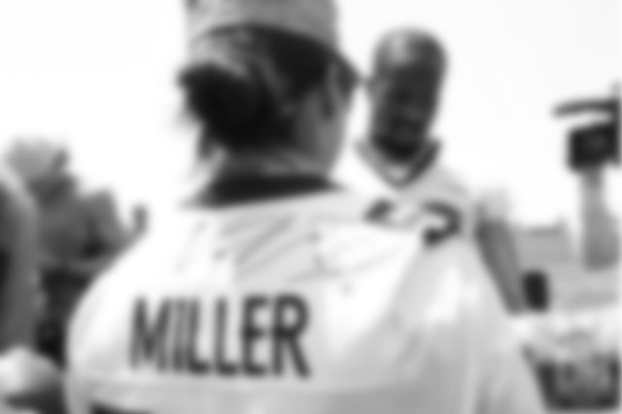 Outside linebacker Von Miller (58) meets military members of the Colorado Air National Guard and the U.S. Army after practice on June 12, 2018. The meet-and-greet was part of an event hosting servicemen and servicewomen with USAA and the Broncos Womens Organization.