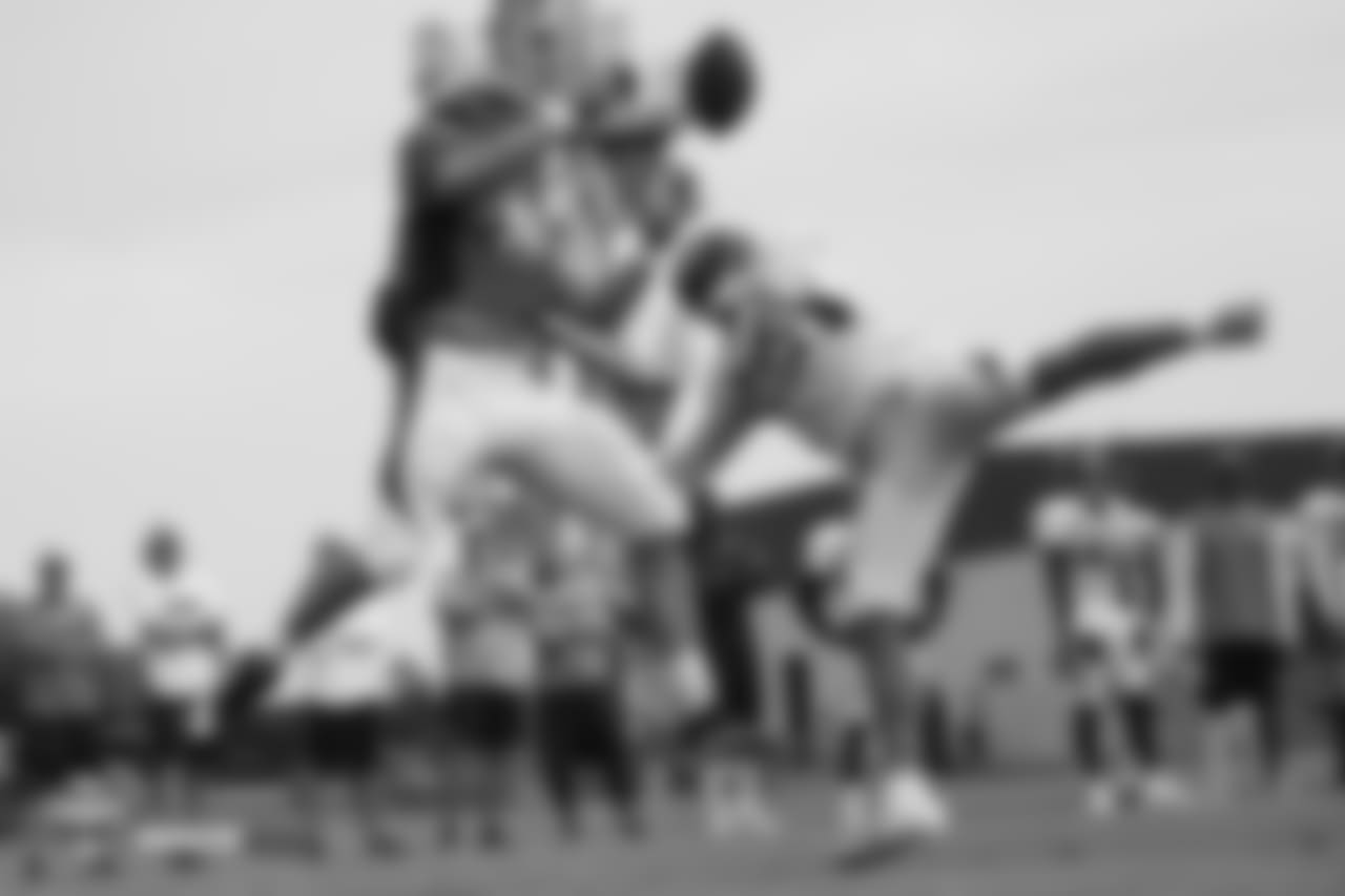 Tight end Brian Parker (89) can't come down with the ball after safety Darian Stewart (26) deflected the pass at the fifth day of training camp on August 1, 2018, at UCHealth Training Center.