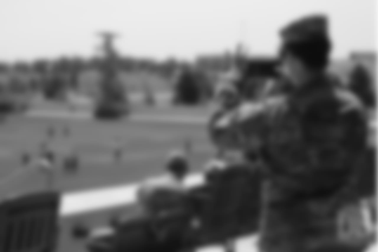 A member of the Colorado Air National Guard takes a photo of practice on June 12, 2018. The meet-and-greet was part of an event hosting servicemen and servicewomen with USAA and the Broncos Womens Organization.