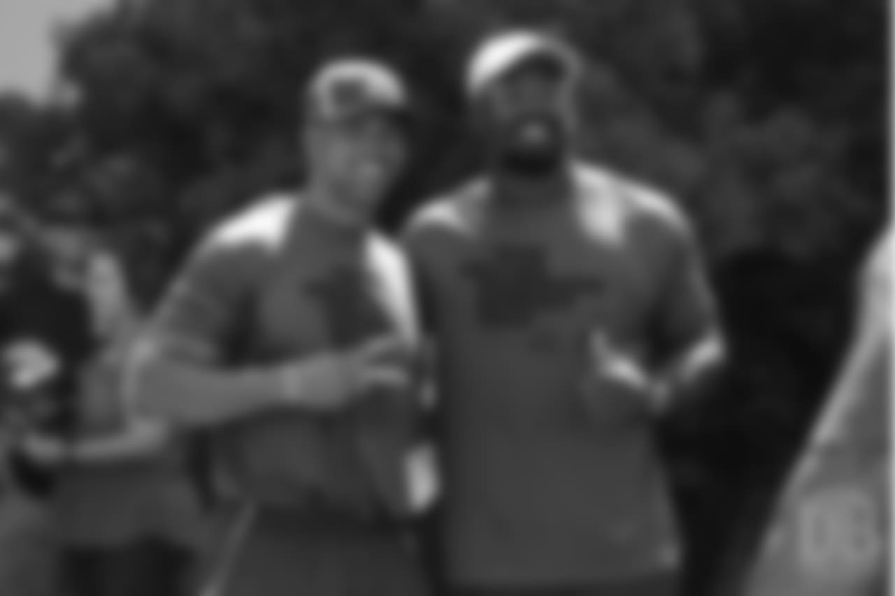 Stanford defensive line coach Diron Reynolds and Von Miller the on-field portion of Von Miller's Pass Rush Summit, which included hands-on instruction and drills, on June 28, 2018.