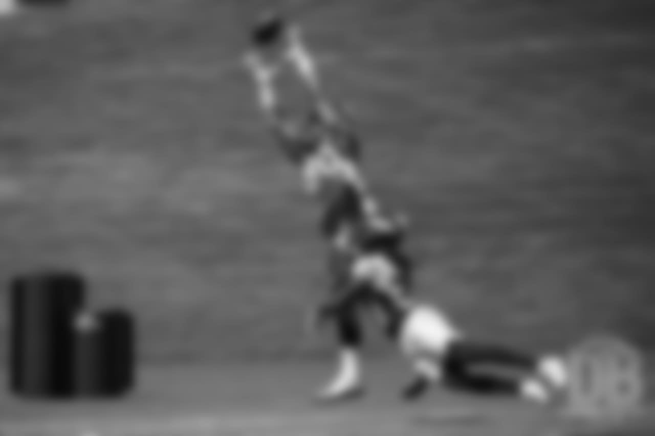 tight end Jake Butt (80) leaps to make a catch during practice at the eighth day of OTAs on June 5, 2018.