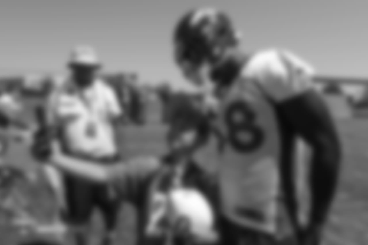 Outside linebacker Von Miller (58) takes a selfie with a young fan after the 11th day of training camp on August 9, 2018, at UCHealth Training Center.