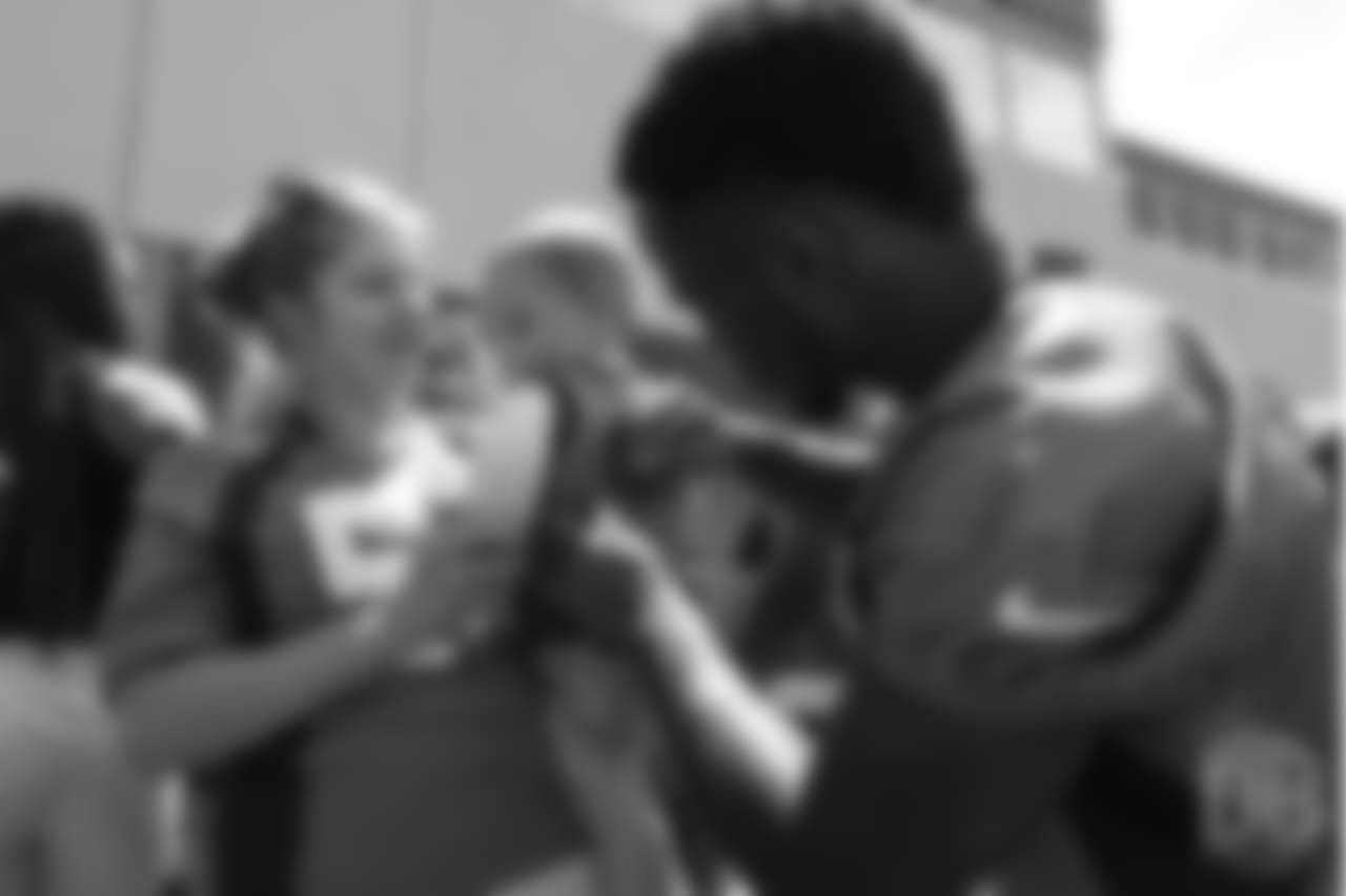 wide receiver Isaiah McKenzie (16) meets patients from Children's Hospital Colorado's burn unit after the final day of OTAs on June 7, 2018 at UCHealth Training Center.