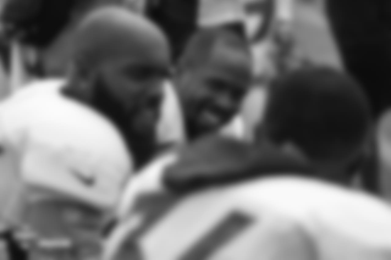 Outside linebacker Von Miller (58) shares a laugh with safety Darian Stewart (26) and safety Will Parks (34) at the sixth day of training camp on August 3, 2018, at UCHealth Training Center.