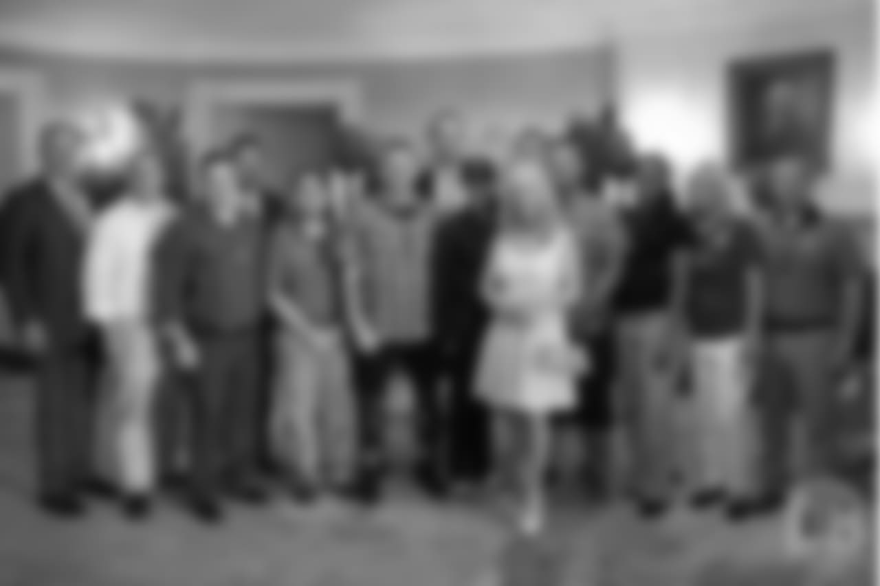 Annabel Bowlen stands with John Elway, Gary Kubiak, DeMarcus Ware, Von Miller and guests from the Wounded Warrior Project, who joined the Broncos for their visit to the White House.