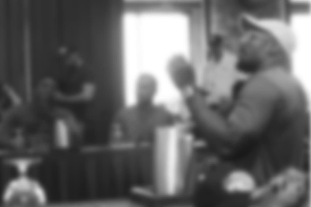 Von Miller and Warren Sapp review player film at Von Miller's Pass Rush Summit, which included hands-on instruction and drills, on June 28, 2018.
