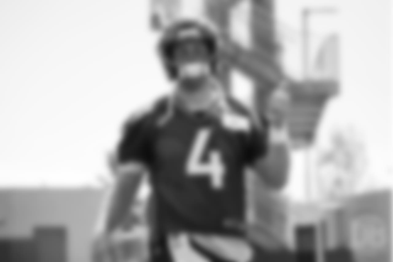 quarterback Case Keenum (4) gives a thumbs up during the 10th and final day of OTAs on June 7, 2018 at UCHealth Training Center.