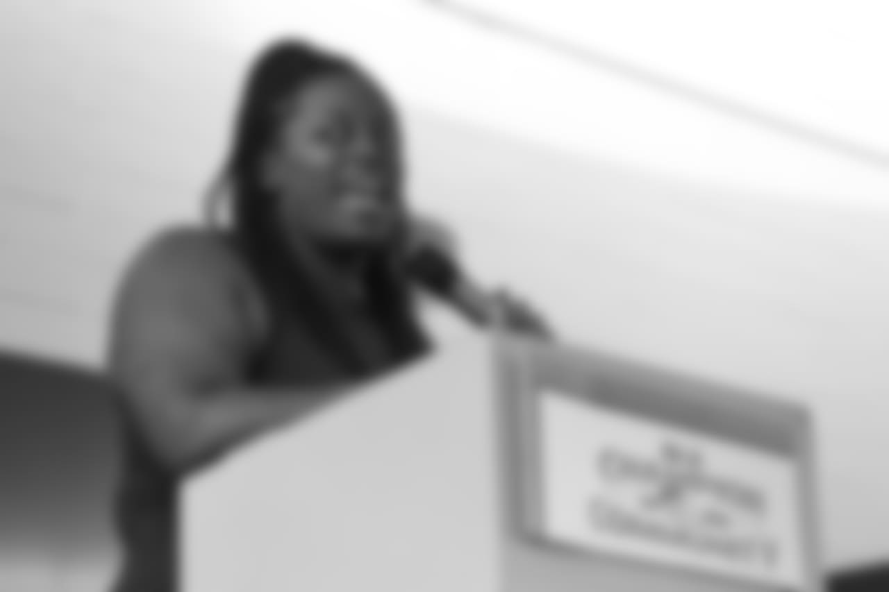TeAndra "T.T." Taylor speaks at the Denver Broncos Boys & Girls Club's 15th anniversary celebration on August 2, 2018.