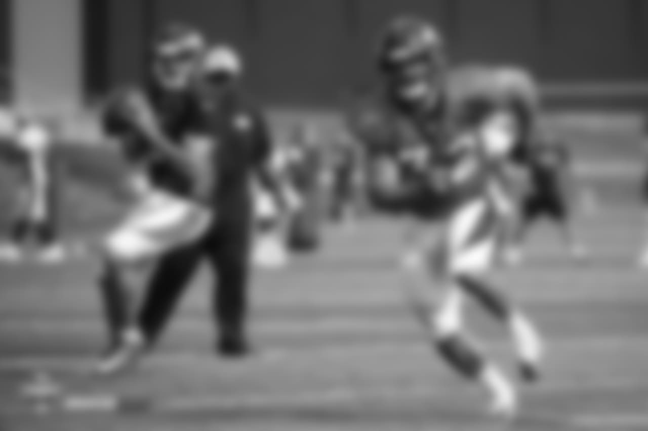 Fullback Andy Janovich (32) runs a route for quarterback Chad Kelly (6) at the fifth day of training camp on August 1, 2018, at UCHealth Training Center.