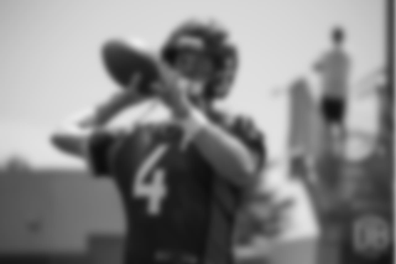 quarterback Case Keenum (4) warms up behind the end zone during the 10th and final day of OTAs on June 7, 2018 at UCHealth Training Center.