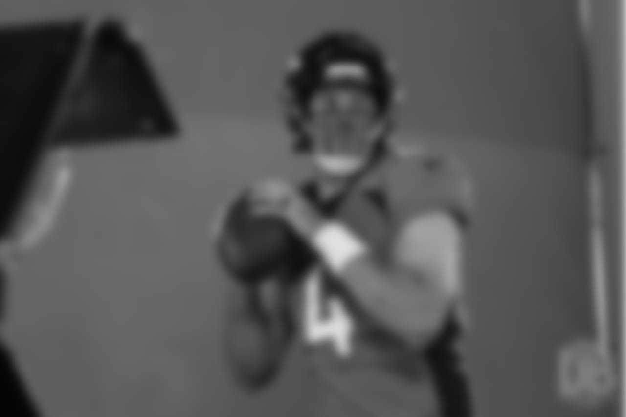 Quarterback Case Keenum (4) poses for photos during the media sessions with network photographers and videographers on June 12, 2018.