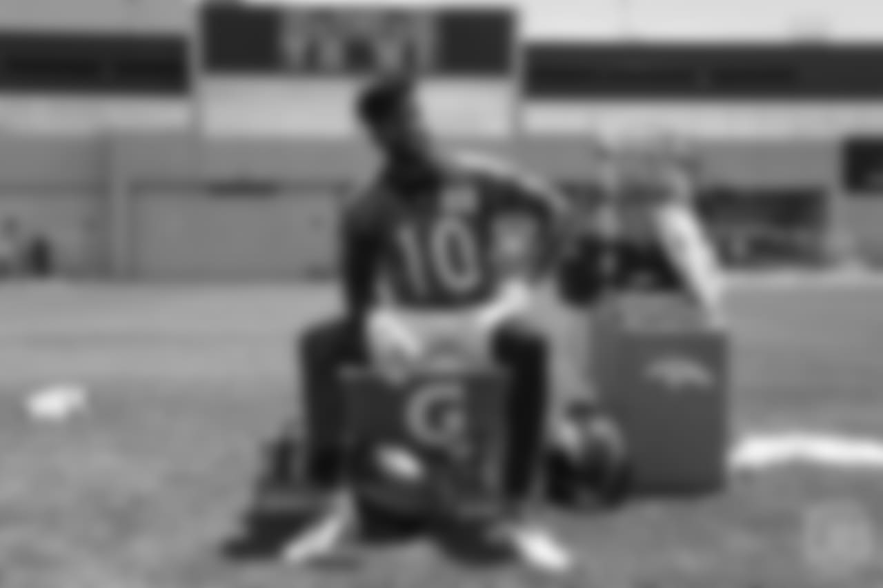 wide receiver Emmanuel Sanders (10) takes a moment to rest between practice periods at the ninth day of OTAs on June 6, 2018 at UCHealth Training Center.