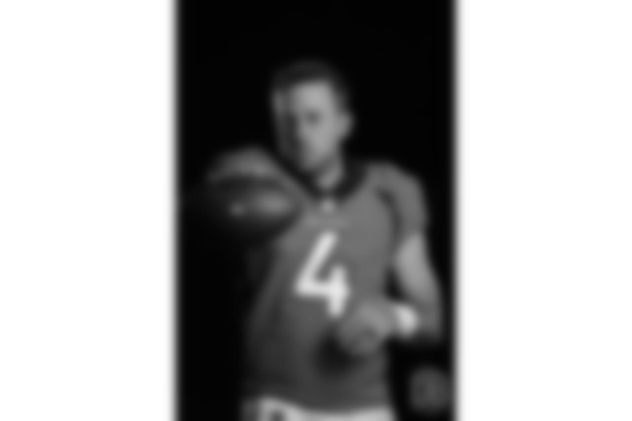 Quarterback Case Keenum (4) poses for photos during the media sessions with network photographers and videographers on June 12, 2018.
