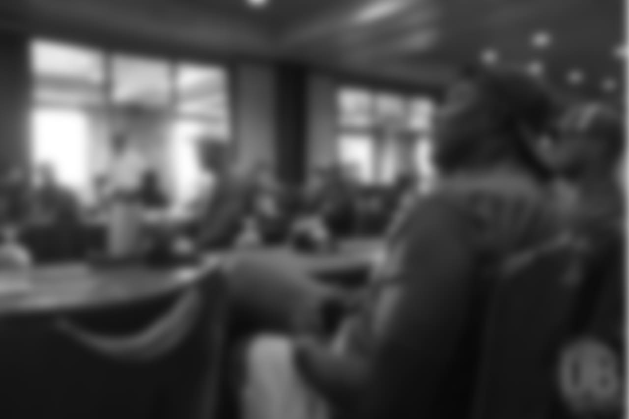 Bruce Smith reviews player film at Von Miller's Pass Rush Summit, which included hands-on instruction and drills, on June 28, 2018.