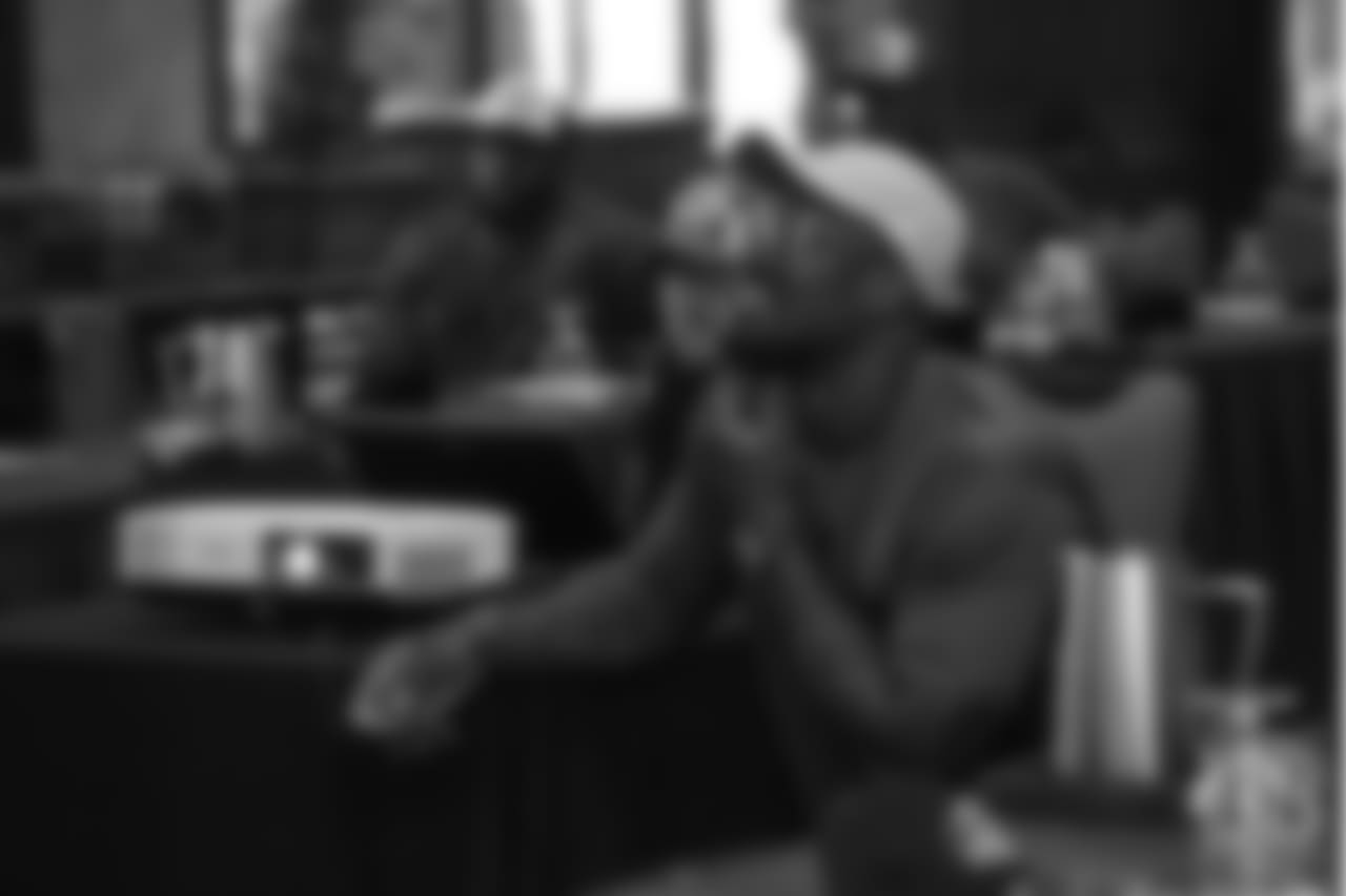 Von Miller reviews player film at Von Miller's Pass Rush Summit, which included hands-on instruction and drills, on June 28, 2018.