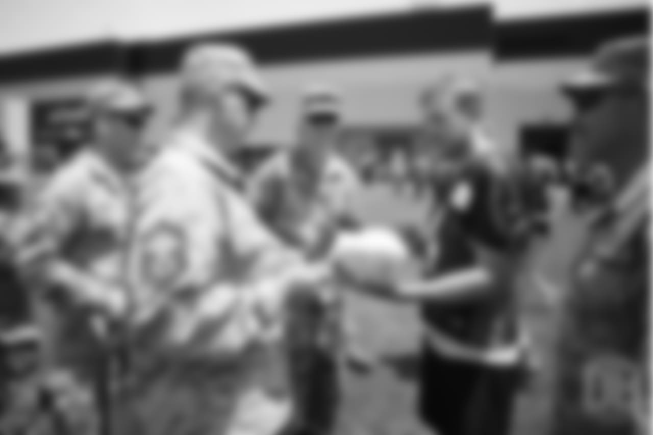 Case Keenum meets military members of the Colorado Air National Guard and the US Army after practice on June 12, 2018. The meet-and-greet was part of an event hosting servicemen and servicewomen with USAA and the Broncos Womens Organization.
Photo by Gabriel Christus