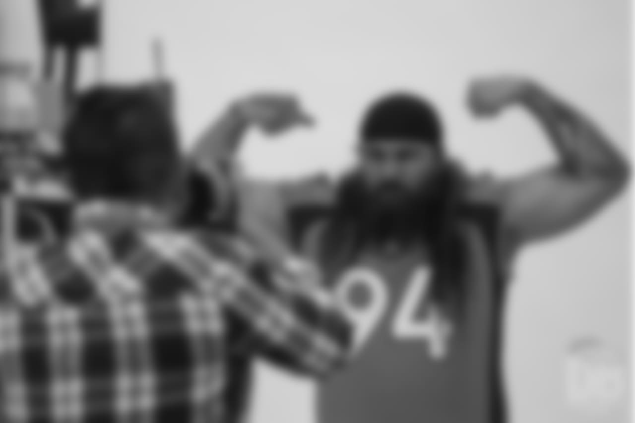 Nose tackle Domata Peko Sr. (94) poses for photos during the media sessions with team photographer Gabriel Christus on June 12, 2018.