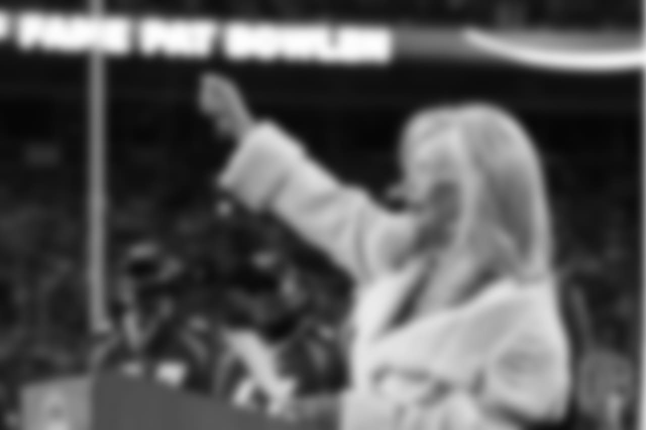 Annabel Bowlen finishes her speech with a flourish during Ring of Fame induction ceremonies for her husband, Broncos Owner Pat Bowlen, on Nov. 1, 2015.