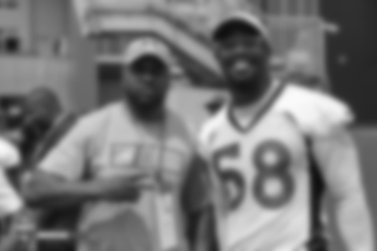 Former Bronco Tatum Bell and outside linebacker Von Miller (58) during the 10th day of training camp on August 8, 2018, at UCHealth Training Center.