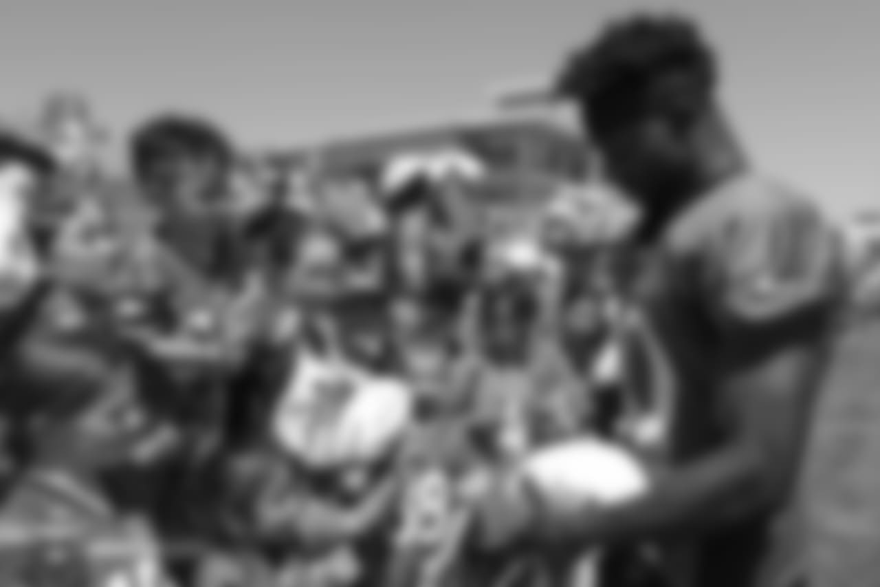 Wide receiver Emmanuel Sanders (10) signs autographs after the 11th day of training camp on August 9, 2018, at UCHealth Training Center.