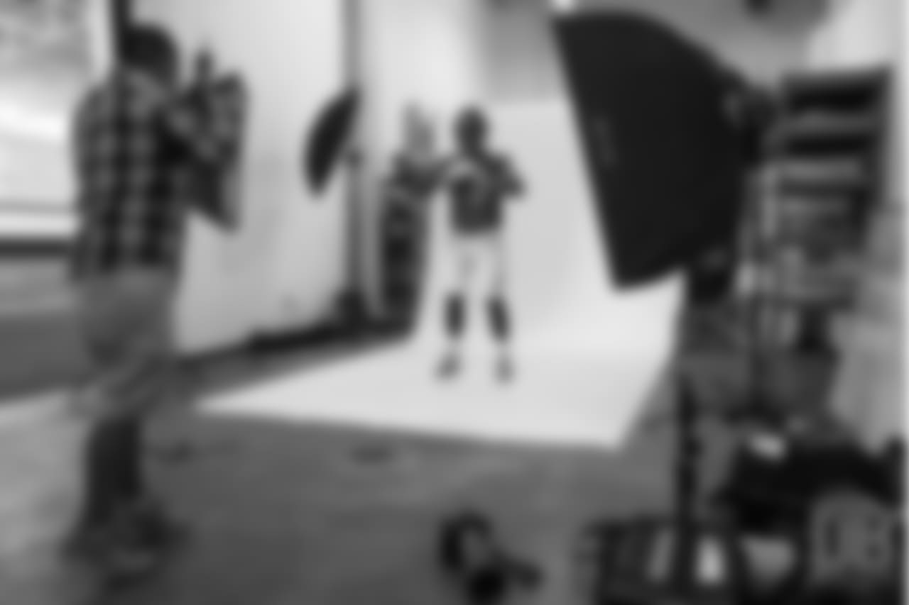 Defensive end Derek Wolfe (95) poses for photos during the media sessions with team photographer Gabriel Christus on June 12, 2018.