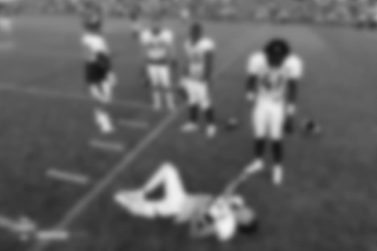 Nose tackle Kyle Peko (90), linebacker Marcus Rush (49), inside linebacker Joseph Jones (43), cornerback Isaac Yiadom (41) and safety Justin Simmons (31) get loose before the eighth day of training camp on August 5, 2018, at UCHealth Training Center.