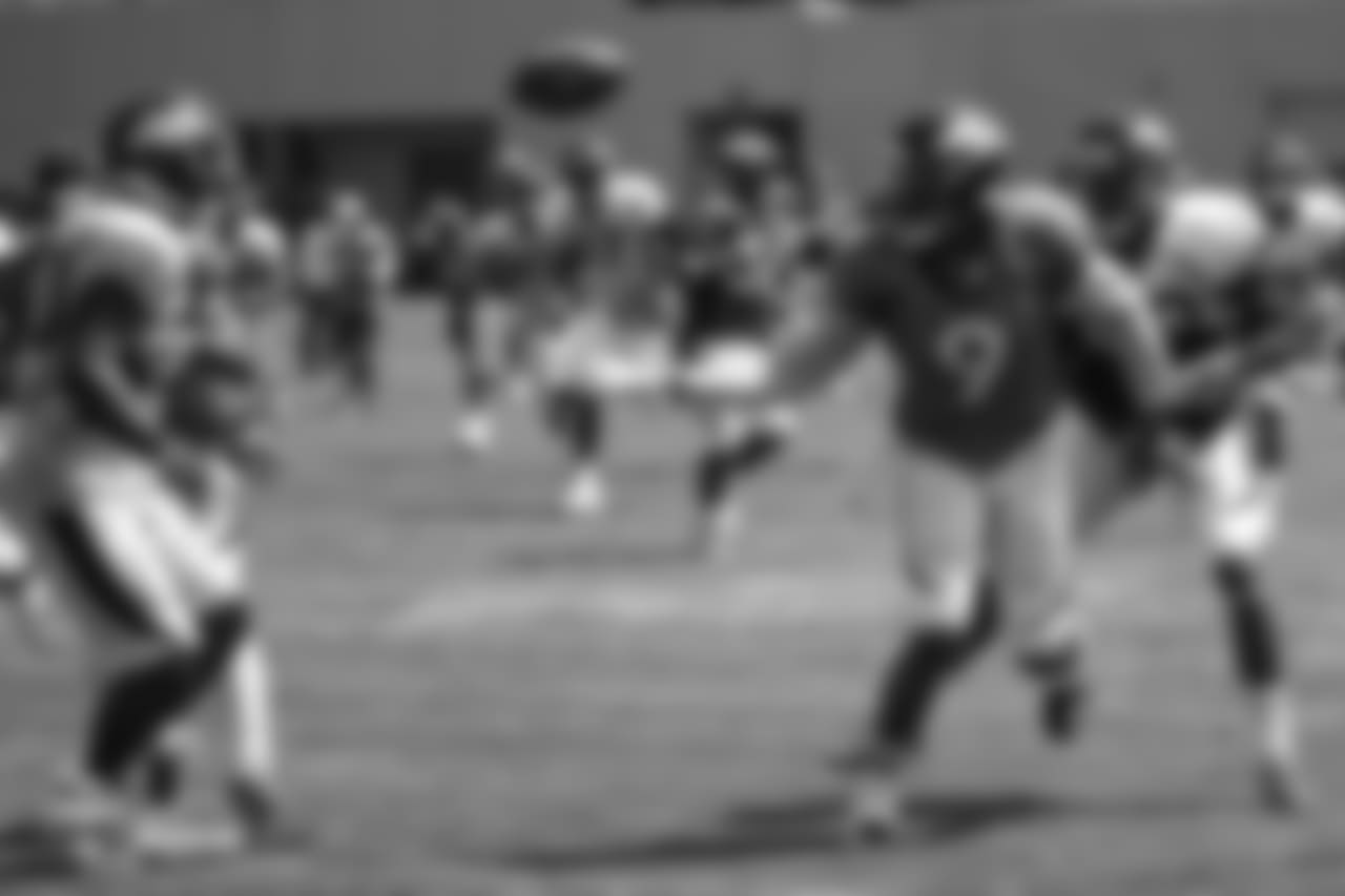 Wide receiver John Diarse (9) loses his handle on the ball after a reception during the seventh day of training camp on August 4, 2018, at UCHealth Training Center. After a couple of deflections off other players, Diarse would corral it and continue upfield.