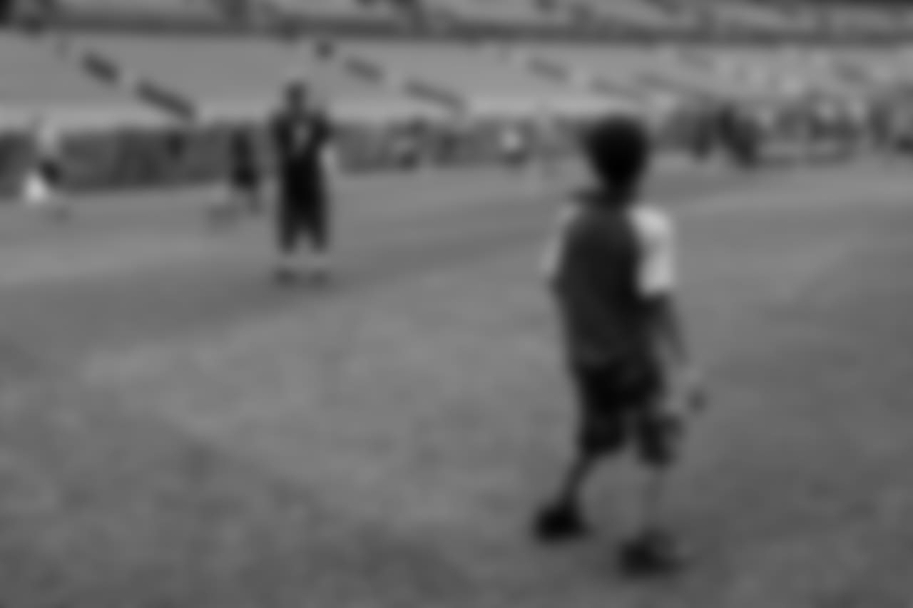 At the 2018 'Pigskin with Pops' event at Sports Authority Field at Mile High on June 17, 2018.