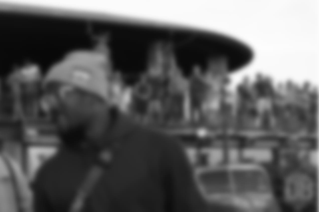 Fans and lodge guests alternate between taking photos and videos of Von Miller and the sunset the first day of Von Miller's Pass Rush Summit, which included a welcome session and a night of games on June 27, 2018.