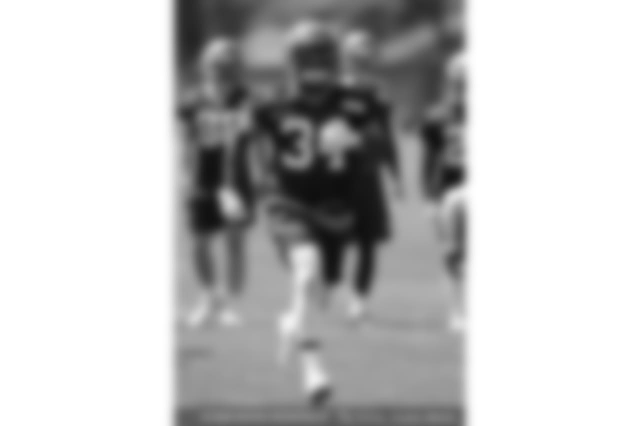 Cleveland Browns running back Carlos Hyde runs a drill during a practice at the NFL football team's training camp facility, Wednesday, May 23, 2018, in Berea, Ohio. (AP Photo/Tony Dejak)