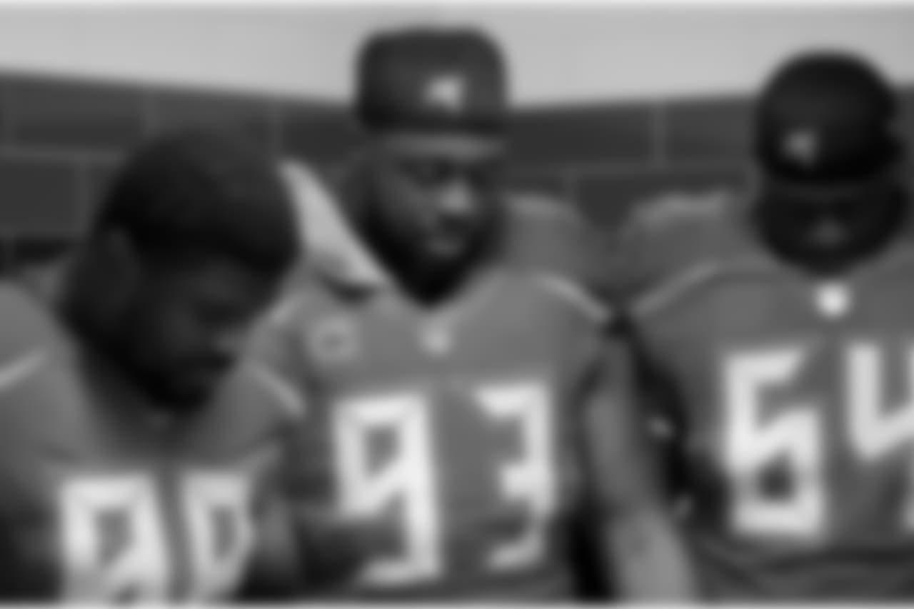 DT Clinton McDonald, DT Gerald McCoy and G/T Kevin Pamphile