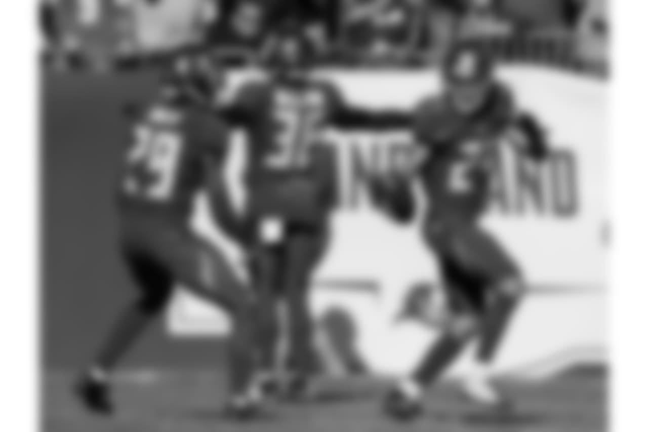 DB Ryan Smith, CB Robert McClain and CB Brent Grimes