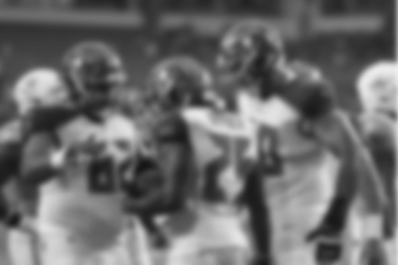 RB Peyton Barber #25, OL Evan Smith #62 and T Brad Seaton #60