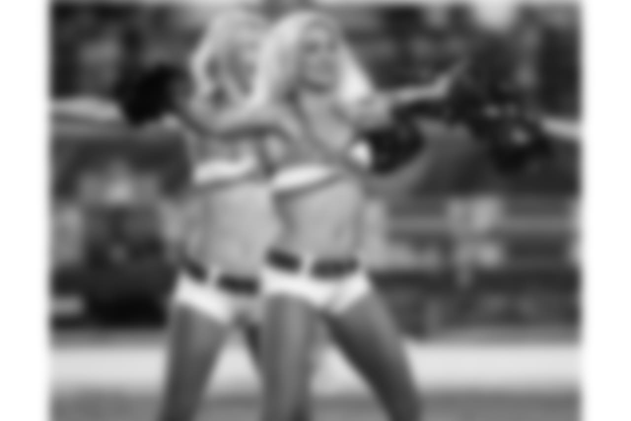 The Cardinals cheerleaders perform
